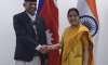 External Affairs Minister Sushma Swaraj greets her Nepali