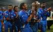 Sachin Tendulkar with the World Cup trophy