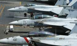 Navy officials say a fighter jet has crashed off the coast