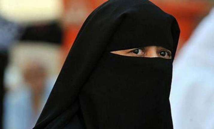 People wearing face-masks or burqas could pose a threat to