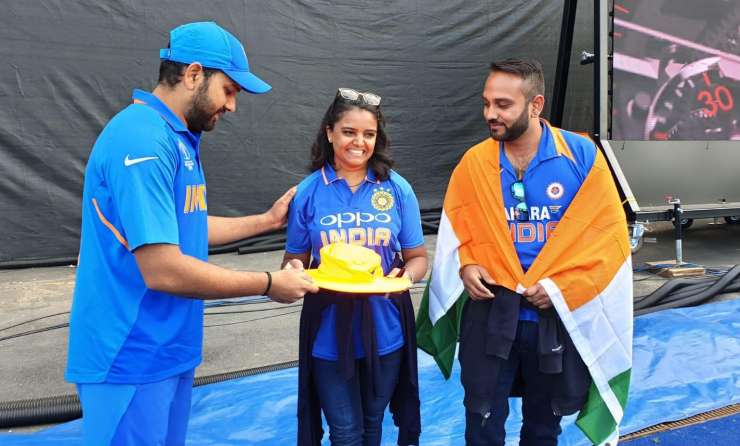 Image result for 2019 World Cup: After being hit by a Rohit Sharma six in Edgbaston, fan gets autographed hat from the man himself