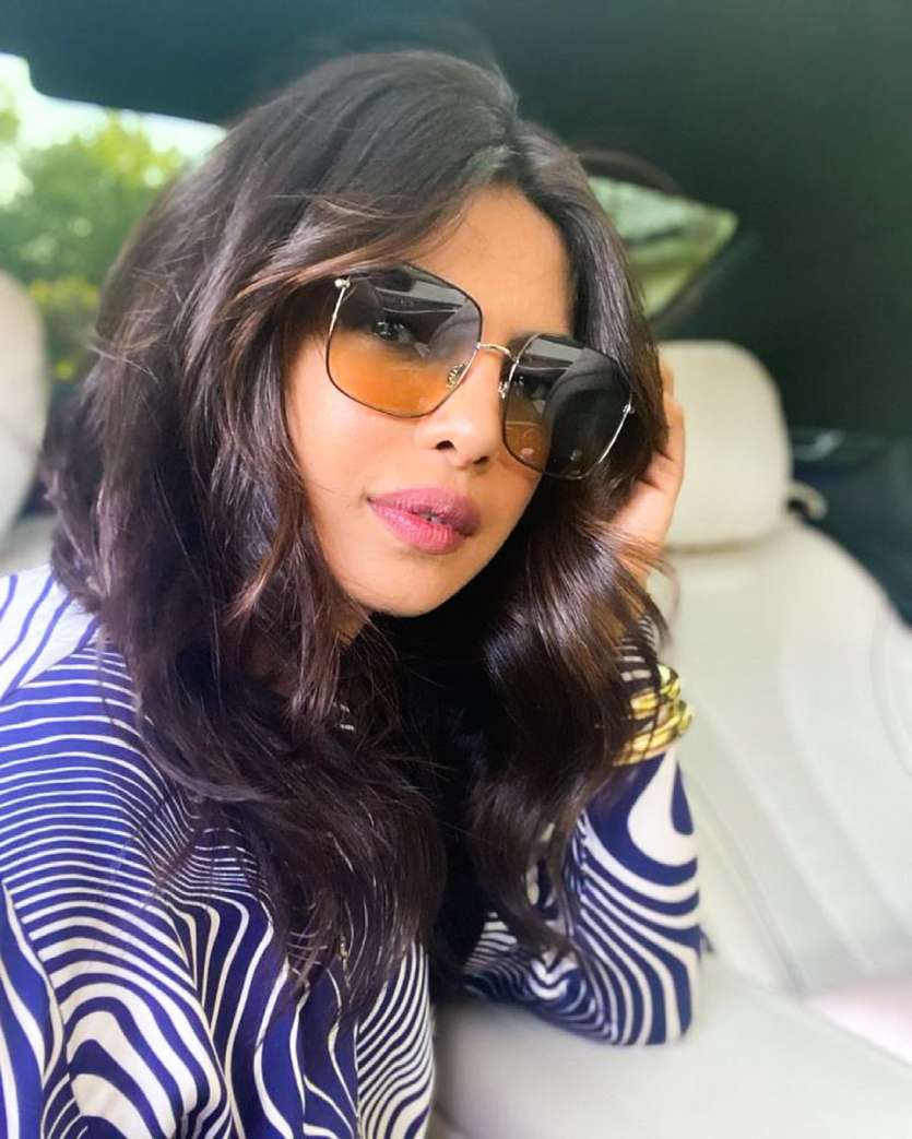 Retro is always in season and Priyanka wearing these super cool tan tinted frames is proof of the same. 